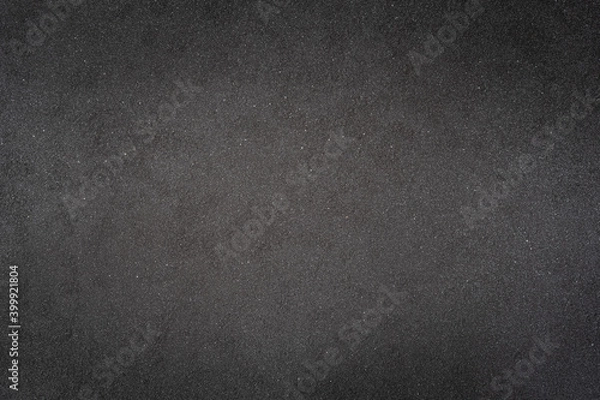 Fototapeta Abstract dark background,Rough surface of black spray paint on Rusty iron plate
