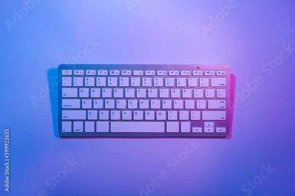 Fototapeta Computer keyboard on color background