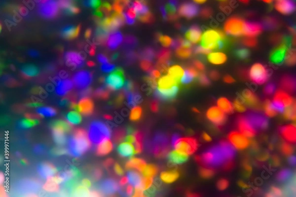 Obraz Colorful bokeh rainbow wallpaper. Neon defocused black overlay.