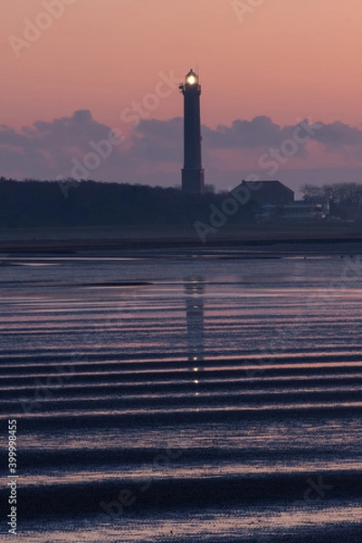 Obraz The Norderney lighthouse at sunrise
