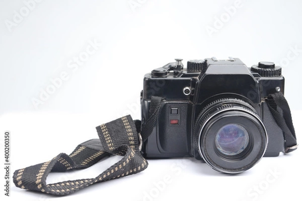 Fototapeta Vintage analog camera with isolated white background. old technology products for photography