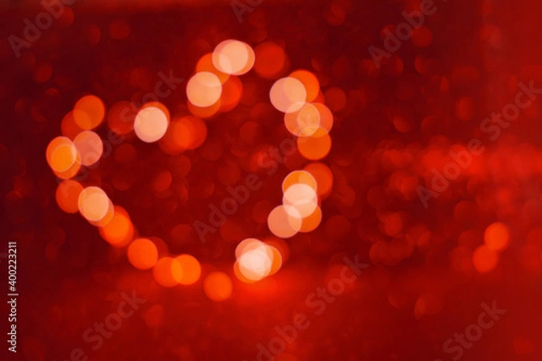 Obraz Valentine's Day background, bokeh red heart. Red glitter sparkle confetti. Invitation to the Happy birthday party.