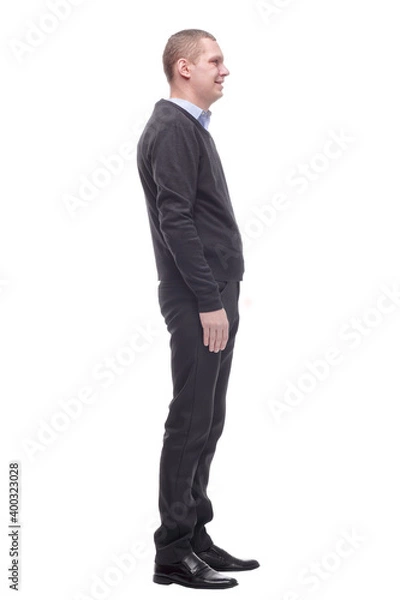 Fototapeta Full length profile portrait of a man standing on white background