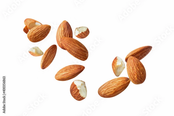 Fototapeta piece side view  almond cracked macro on white isolated