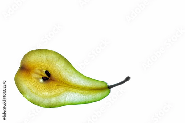 Fototapeta Green pear slice isolated on a white background.