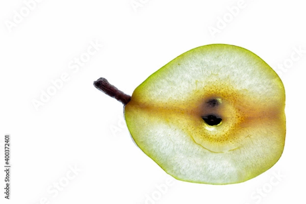Fototapeta Green pear slice isolated on a white background.