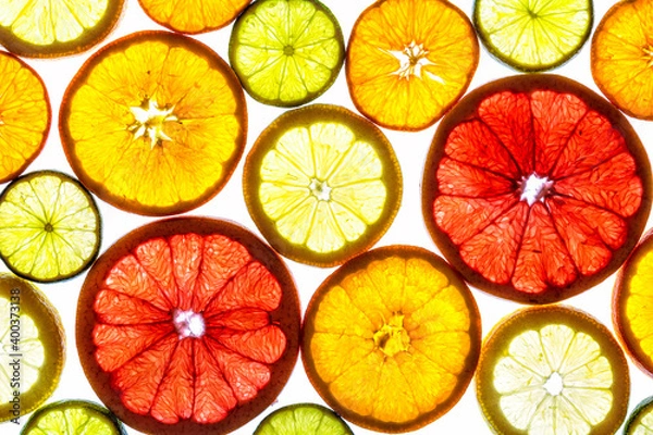 Fototapeta Collage of various fruit slices isolated on a white background.