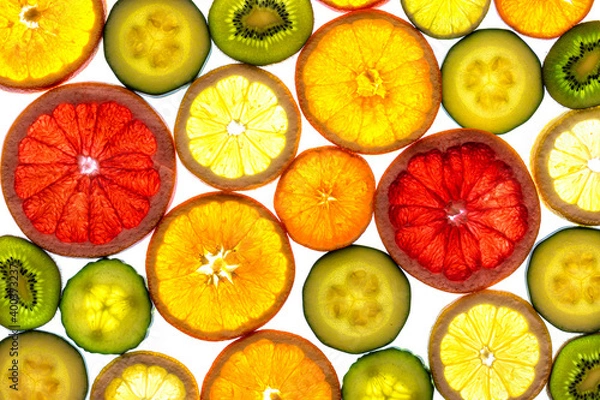 Fototapeta Collage of various fruit slices isolated on a white background.
