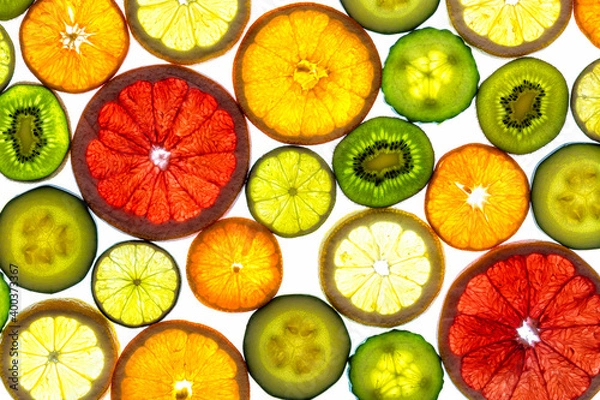 Fototapeta Collage of various fruit slices isolated on a white background.