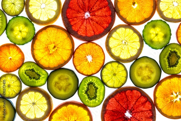 Fototapeta Collage of various fruit slices isolated on a white background.