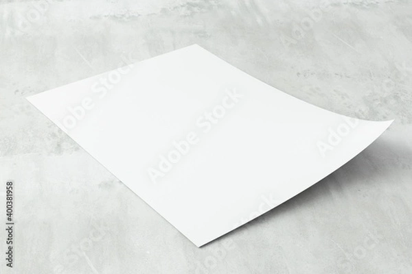 Fototapeta White vertical paper sheet Mockup, letter or invitation on concrete floor