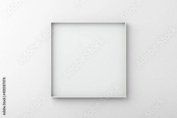 Fototapeta White square frame on an empty wall