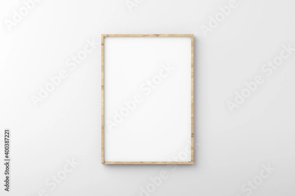 Fototapeta Thin wooden empty frame on white wall for mockup