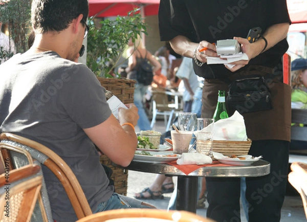 Fototapeta płacenie za posiłek