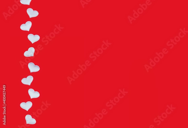 Fototapeta White hearts on red background. Minimalistic postcard, invitation. Copy space. Top view. Concept for choosing gifts for Valentine's Day or romantic date