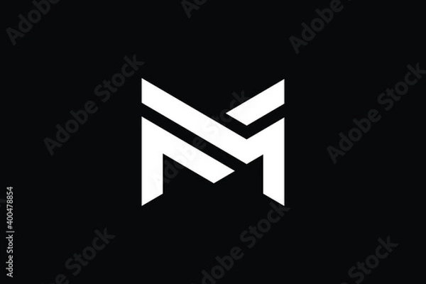 Fototapeta M logo letter design on luxury background. MM logo monogram initials letter concept. M icon logo design. MM elegant and Professional letter icon design on black background. M MM