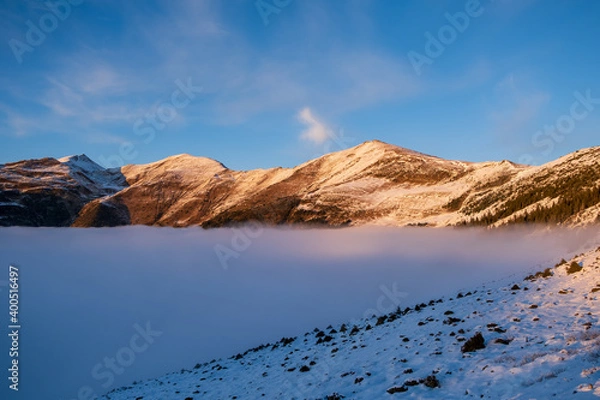 Obraz Mountain Ridge with sea of clouds.