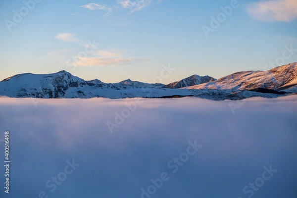 Obraz Mountain Ridge with sea of clouds.