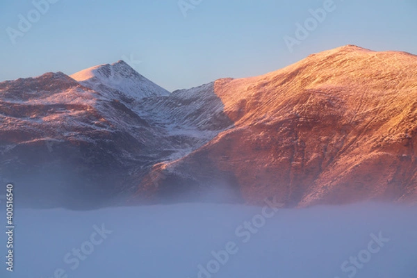 Fototapeta Mountain Ridge with sea of clouds.