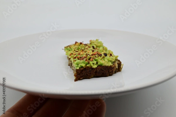 Obraz avocado on a black bread