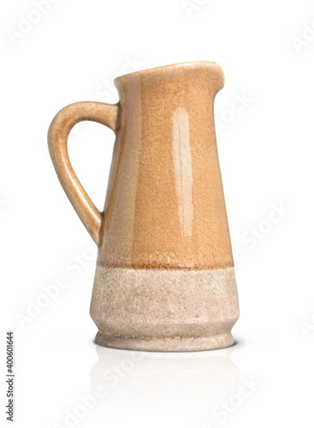 Fototapeta Empty brown ceramic jug for flowers with handle on white isolated background