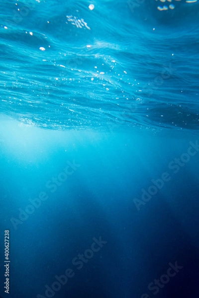 Obraz Blue water with sunbeam