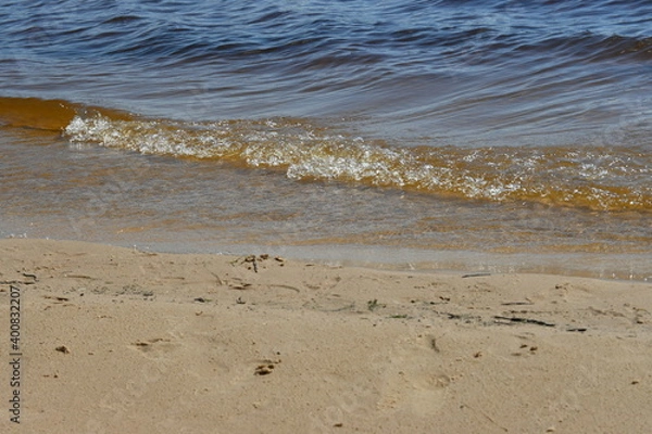 Obraz waves on the river beach