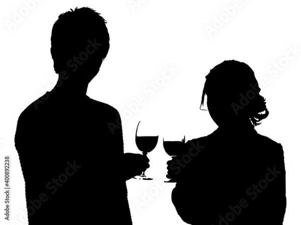 Fototapeta 乾杯する男女のシルエット