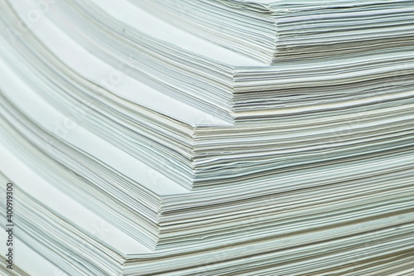Fototapeta bundles bales of paper documents. stacks packs pile on the desk in the office