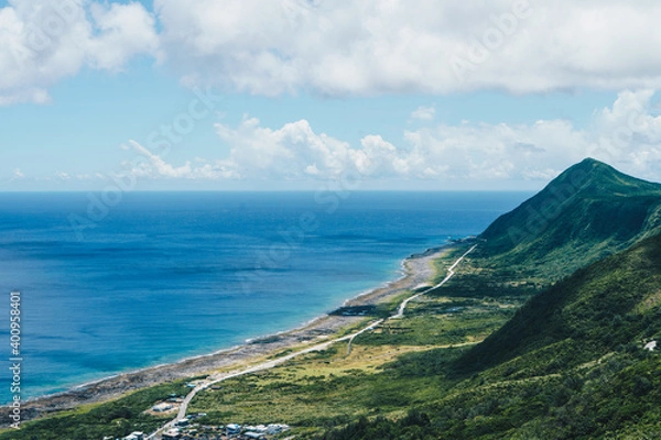 Obraz The top view of the ocean and mountain on the top point (Lanyu weather station) of Lanyu island in summer.
