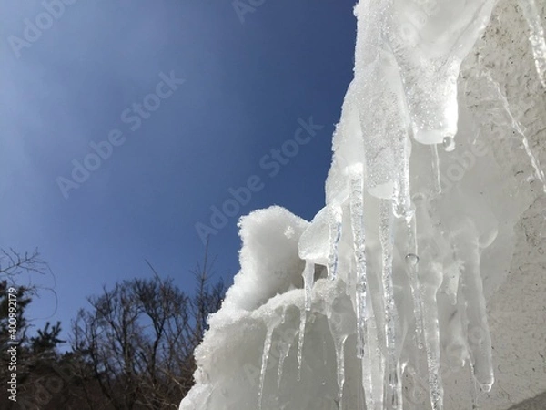 Fototapeta icicles on a roof