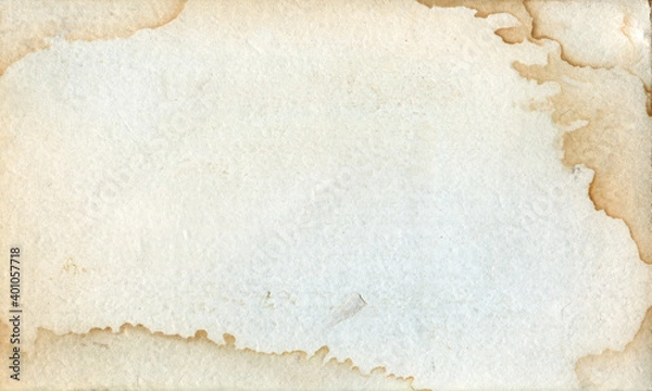 Fototapeta Texture of an old paper with water stains as a background