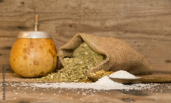 Fototapeta yerba mate infusion, with grated coconut and chamomile, called coconut mate