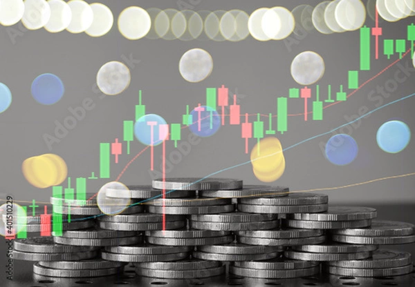 Fototapeta Stack of money coin with forex trading graph, financial investment concept use for background