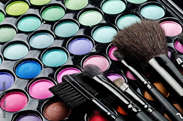 Fototapeta Multi colored make-up and brushes
