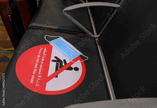 Obraz Do not seat warning sign on seating chair at airport. 