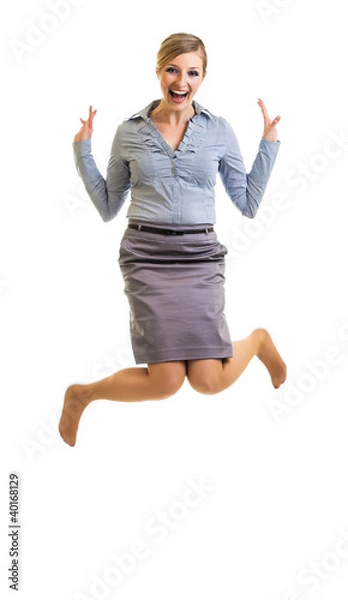 Obraz Business woman jumping with happiness isolated on white