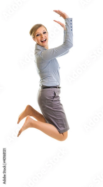 Obraz Business woman jumping with happiness isolated on white