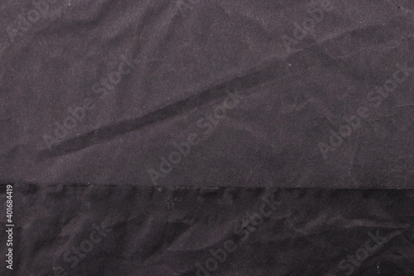 Fototapeta Black crumpled paper texture. Dark blank background.