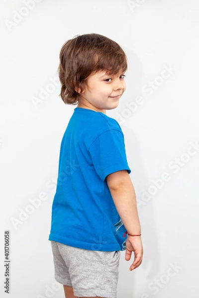 Obraz portrait of an emotional boy on a light background