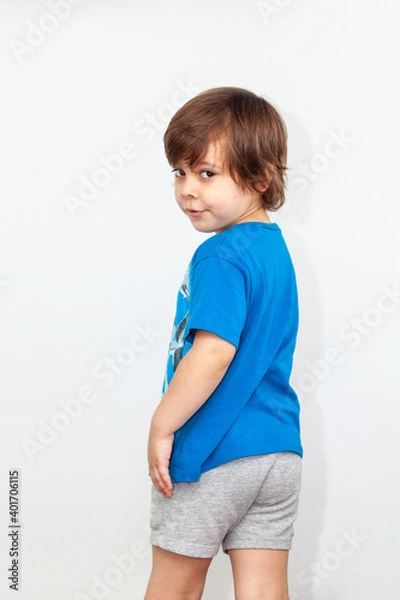 Fototapeta portrait of an emotional boy on a light background