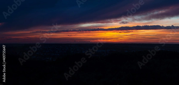 Obraz Deep blue rainy clouds and  some rays of light