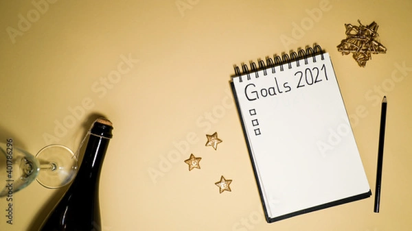 Obraz notebook with goal list 2021 yellow background Vorsätze