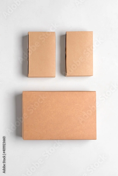 Fototapeta Blank cardboard boxes on white background
