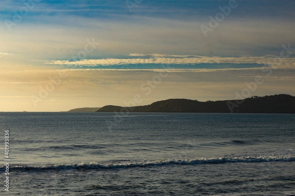 Fototapeta A distant view of a peninsula outside of St Austell in Cornwall England