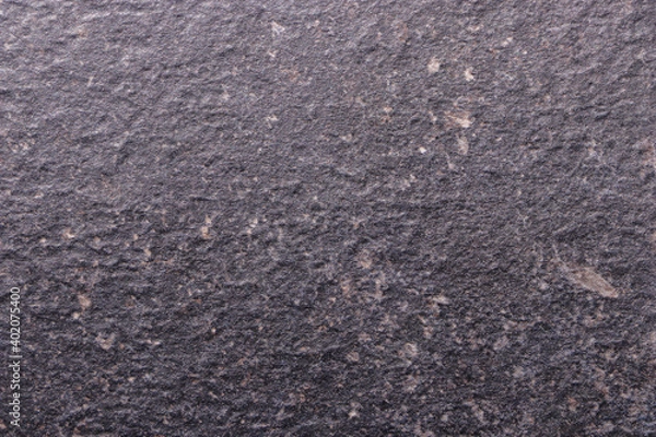 Fototapeta Grey scuffed background imitating the surface and texture of a stone. Empty background.
