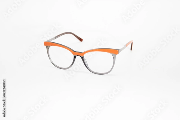 Obraz Optic glasses white background orange frame
