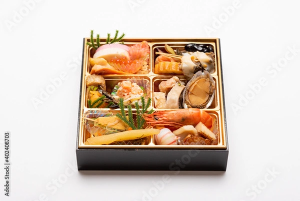 Fototapeta 白背景の上に置いた、おせち料理