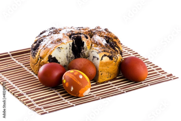 Obraz general plan for the Easter eggs and cake on the mat isolate