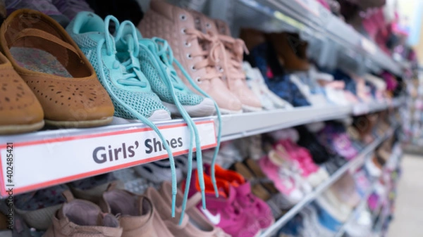 Obraz Shoes on Shoe Rack